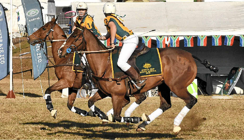 SEMI: Lauren Cant (Cunningham club) passes the ball to Lizzie Lyster during an Australian win in the Polocrosse World Cup and will play in tonight’s semi.